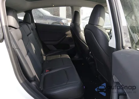 2023 Tesla Model Y Awd/Long Range Dual Motor All-Wheel Drive z USA, uszkodzony, nr VIN 7SAYGDEE0PA043159